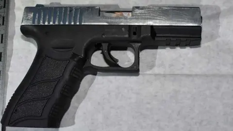 Bedfordshire Police A gun on a table surface