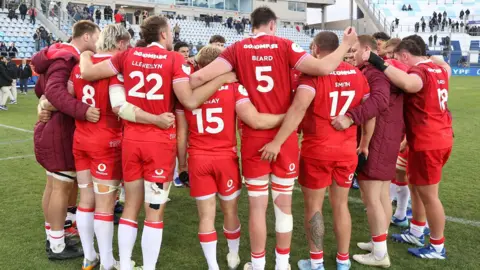 Wales players in a huddle