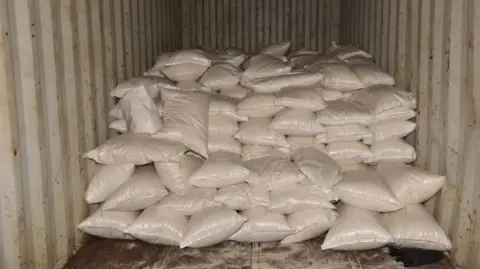 National Crime Agency Sacks of gari powder with drugs hidden in them 