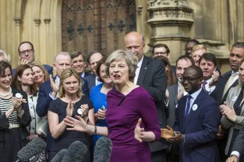 Getty Images Theresa May giving a speech
