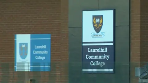 A shot of Laurelhill Community College entrance above the door is a navy and white sign that says Laurelhill Community College