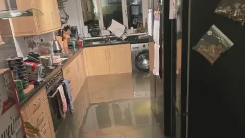Water poured through Wendy Gilligan's home
