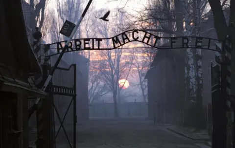 AFP/Getty Images The main gates at the entrance to the Auschwitz I Nazi concentration camp in Oswiecim, Poland, pictured as the sun sets