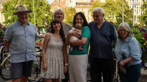 Yew Tree Farm Catherine Withers standing outside City Hall in Bristol with five supporters.