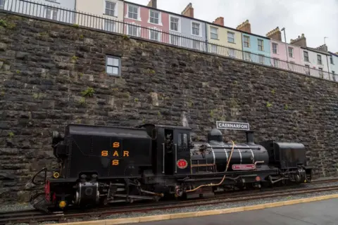 A steam train below Rhes Segontiwm