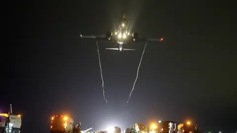 Jamie Niblock/BBC London Stansted Airport at night