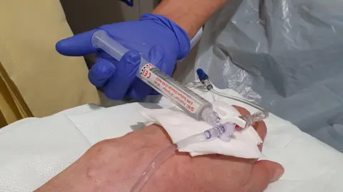 The Christie Photograph of a patient receiving a vaccine for bowel cancer 