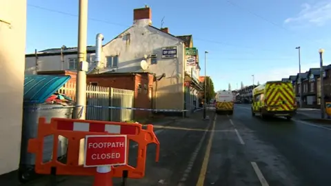 Police tape at scene of incident