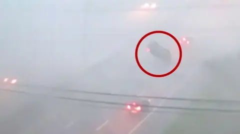 Image shows vehicle flipped due to storms in Ohio.