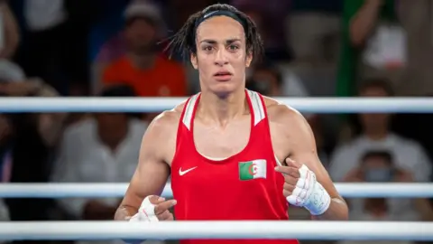Imane Khelif celebrates winning gold at the Olympic Games in Paris last year