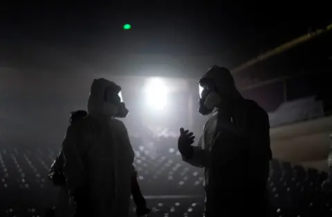 Reuters Volunteers disinfect the Qintai Grand Theatre in Wuhan