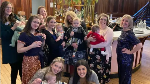 York Mumbler  Group of parents wear party dresses