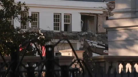 Reuters Image of a window removed in construction on the East Wing of the White House.