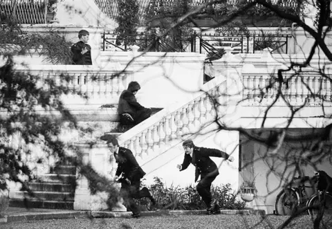 N. Beattie/Evening Standard/Hulton Archive/Getty I Police outside the embassy