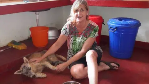 Street Dog Watch Mary with Rambo