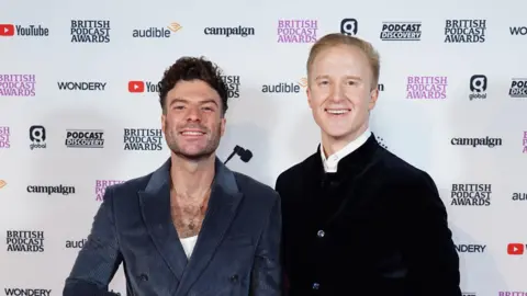 PA Media Jordan North and William Hanson on the red carpet at the British Podcast Awards