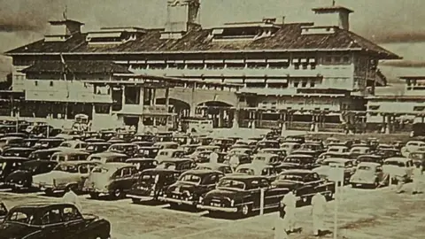 Singapore Turf Club Cars parked outside Singapore Turf Club's Bukit Timah racecourse.