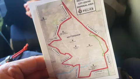 The dispersal notice shows a map of the exclusion zone around the city centre