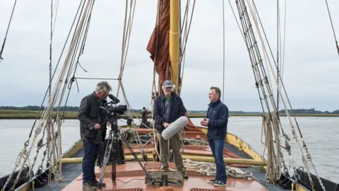 Jemma Watts From left, presenter John McCarthy, film producer Malcolm Hodd, and director/cameraman Tim Curtis