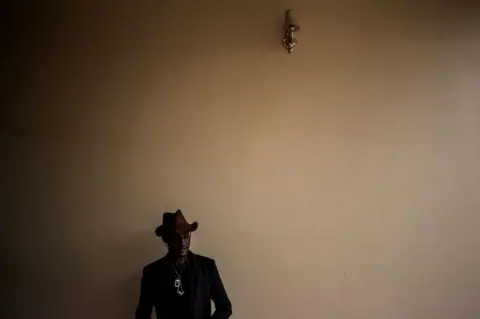 AFP A young man is seen ahead of a welcoming ceremony for first year students on February 3, 2018 in Beni...