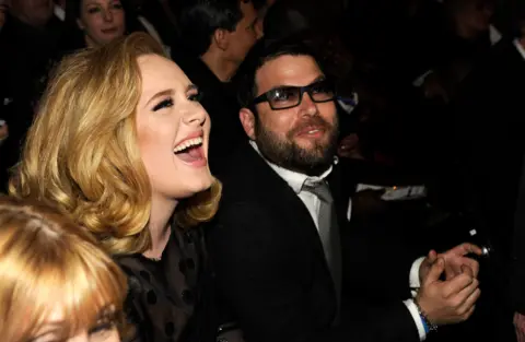 Getty Images Adele and Simon Konecki at the Grammy Awards in 2013