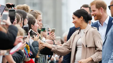 Chris Jackson/Getty Images The Duke and Duchess of Sussex meeting crowds in Auckland, New Zealand