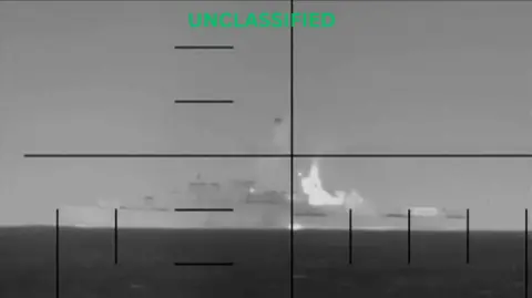 Reuters An explosion on what the U.S. Department of Defense says is an Iranian warship, at the sea, in this screengrab obtained from a handout video released on 4 March 2026.