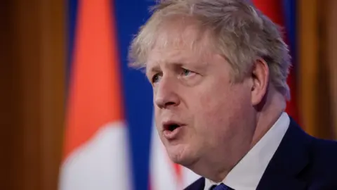 Boris Johnson at a Downing Street press briefing