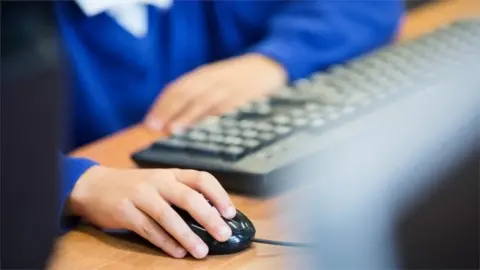 Getty Images Boy using a computer