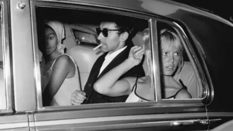 Getty Images Jean-Luc Godard and Brigitte Bardot in a car