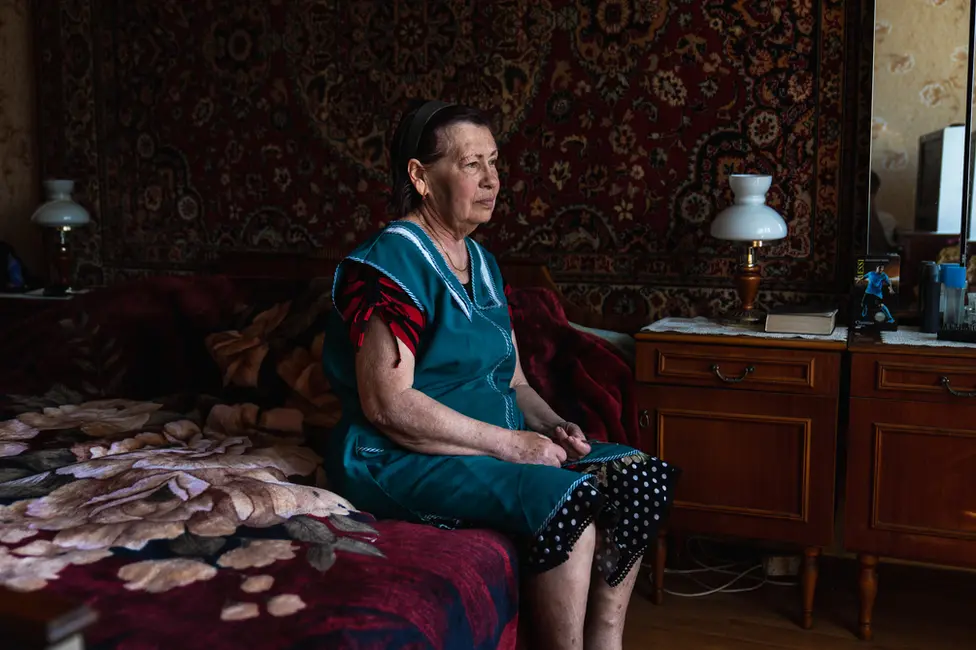 BBC Tamara sits in her bedroom in her half-destroyed building. “It was a beautiful here," she said. "Now there is nothing left"