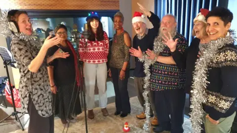 Stuart Low Trust Choir singing