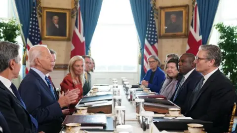 PA Media Prime Minister Sir Keir Starmer (right) and Foreign Secretary David Lammy (second right) during a meeting with US President Joe Biden (centre left) in the Blue Room at the White House in Washington DC. Picture date: Friday September 13, 2024.