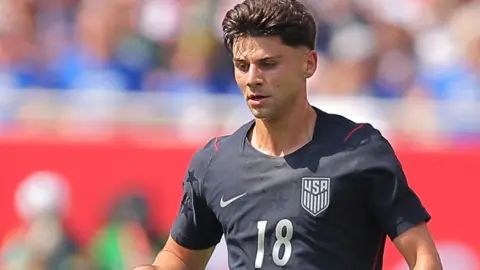 Max Arfsten in action for USA in a pre-World Cup friendly