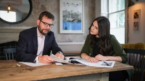 Employment lawyer Luke Menzies and Reporter Lora Jones