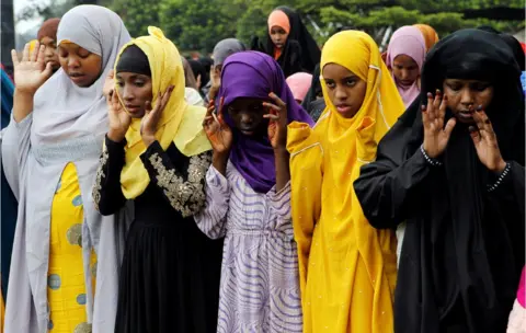 Reuters Muslims attend Eid al-Fitr prayers to mark the end of the holy fasting month of Ramadan at the Sir Ali Muslim Club Ground in Nairobi, Kenya June 15, 2018