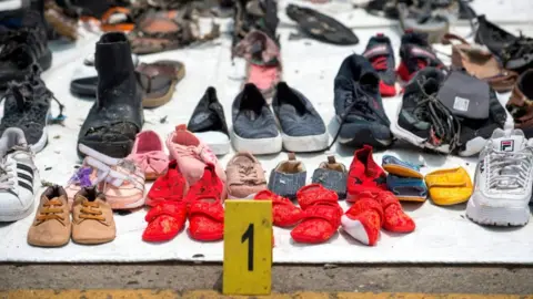 Getty Images Personal items recovered from the Lion Air crash on 29 October, 2018