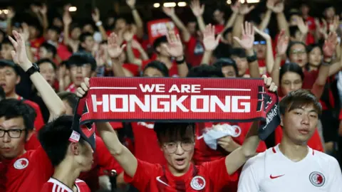 Reuters Soccer fans demonstrate inside Hong Kong Stadium