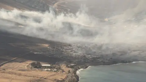 EPA An arial view of buildings damaged in Lahaina, Hawaii as a result of a large wildfire which has killed 6 people and forced thousands of evacuations on the island of Maui in Hawaii, USA, 09 August 2023. Winds from Hurricane Dora, which is currently over the Pacific Ocean hundreds of miles south of Hawaii, have intensified the wildfires.