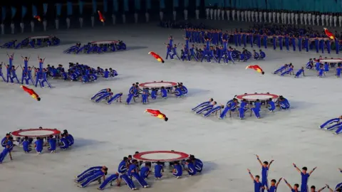 Reuters Athletes doing a gymnastics performance