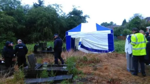 West Midlands Police Scene of the exhumation