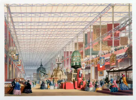 Getty Images A colour image showing the interior of the Crystal Palace during the Great Exhibition of 1851. Huge amounts of glass can be seen on the ceiling with figures dressed in colourful Victorian clothes