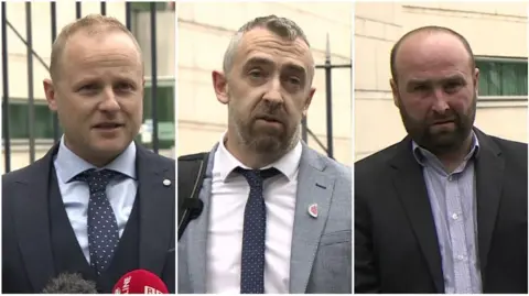 A composite image of Jamie Bryson, Daithí McKay and Thomas O'Hara pictured during separate press conferences outside court on Thursday. Mr McKay has short, greying hair and a beard and is wearing a grey suit. Mr O'Hara has receding dark hair and a beard and is wearing a black suit jacket and a grey shirt.