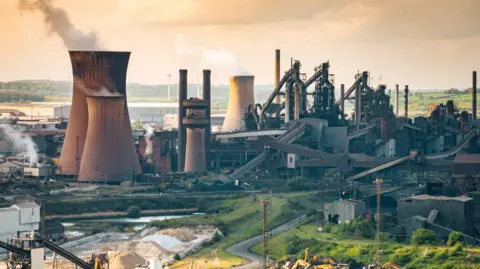 Chimney stacks and other buildings - part of Scunthorpe's steelworks - dominate the town's skyline.