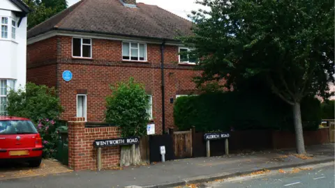 Brian Robert Marshall The meeting of Wentworth Road and Aldrich Road. The road signs are almost right next to each other.