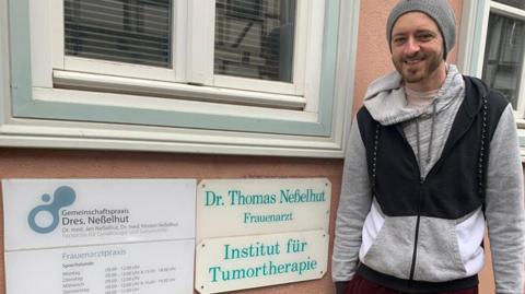 Mark Thompson at German cancer clinic