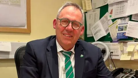 BBC Andy Jehan, the Minister with responsibility for Sport