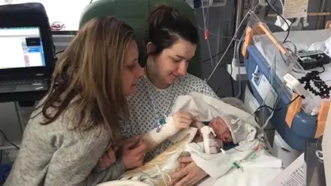 PA Media Oscar Parodi with his mother Chelsea and grandmother Christine Bell