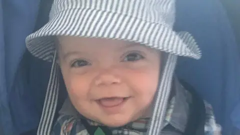 Family photo Gunner smiling