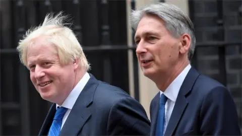 Reuters Boris Johnson and Philip Hammond, in 2019